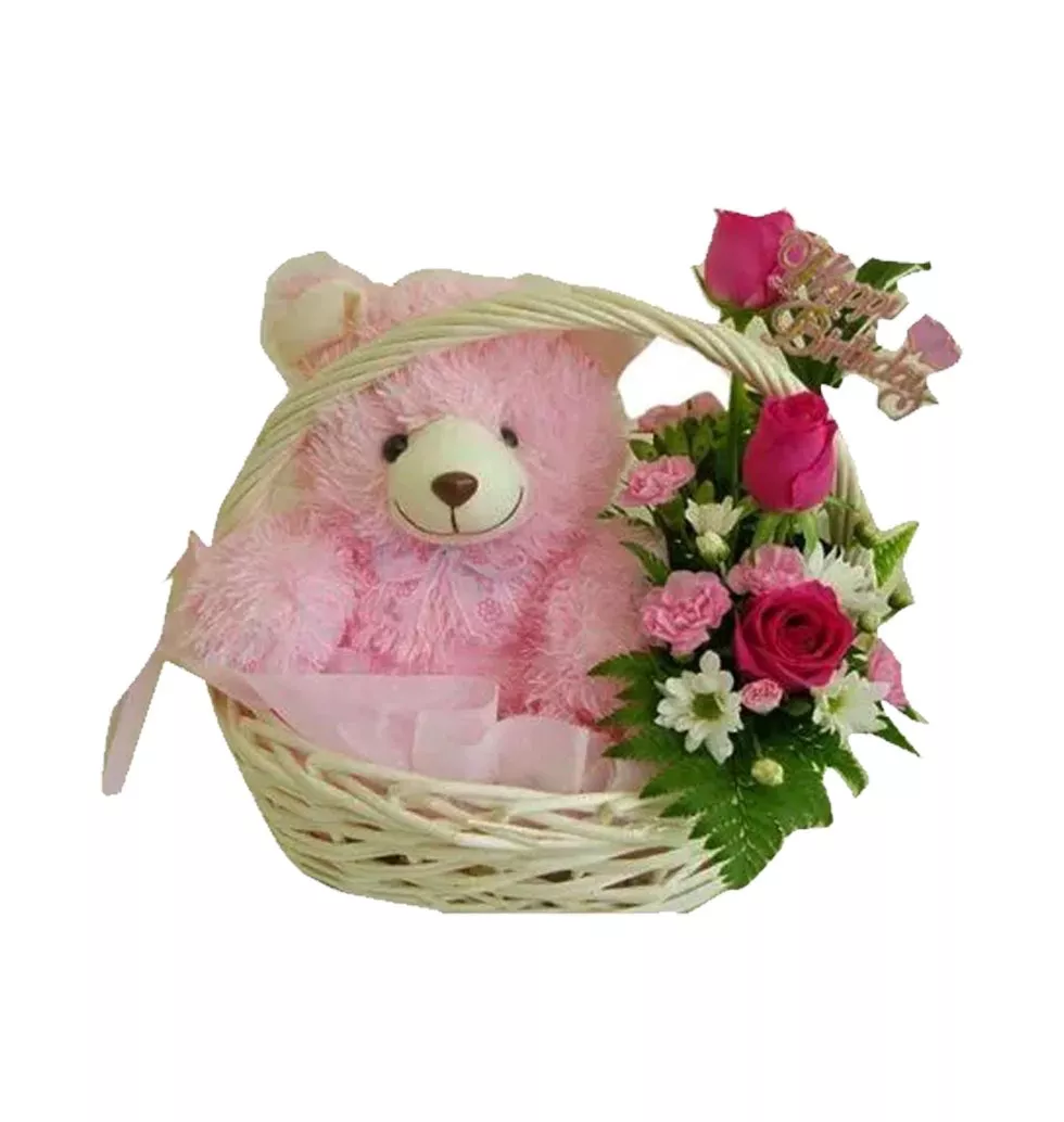 A Pink Teddy With A Bunch Of Roses