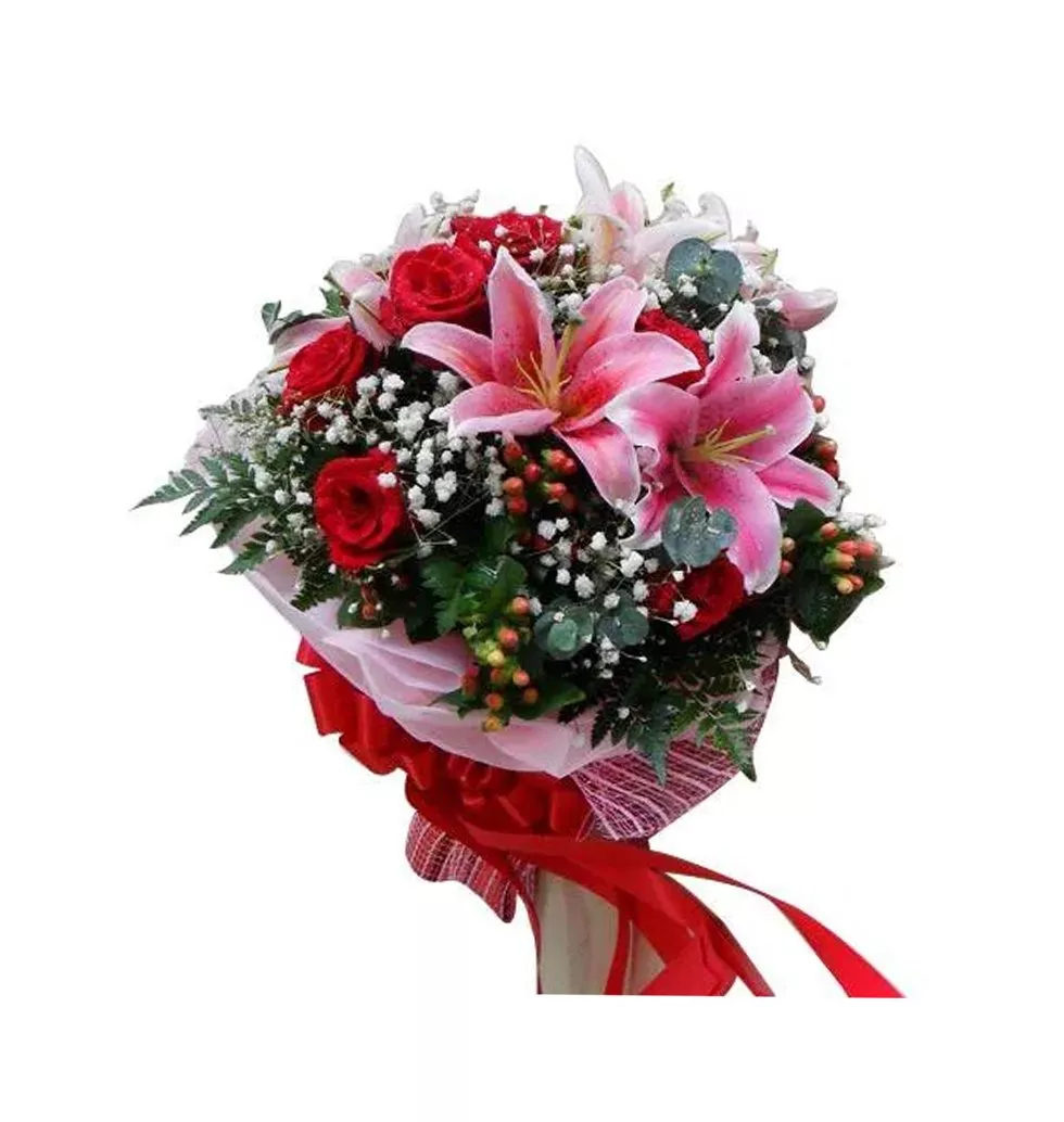 Artful Combination of 4 Pink Lilies with 6 Red Roses