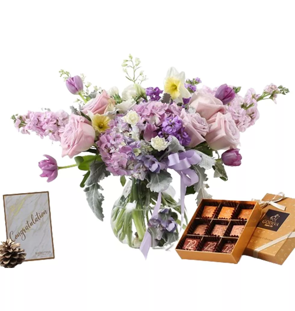 Flowers In Vase And Chocolates